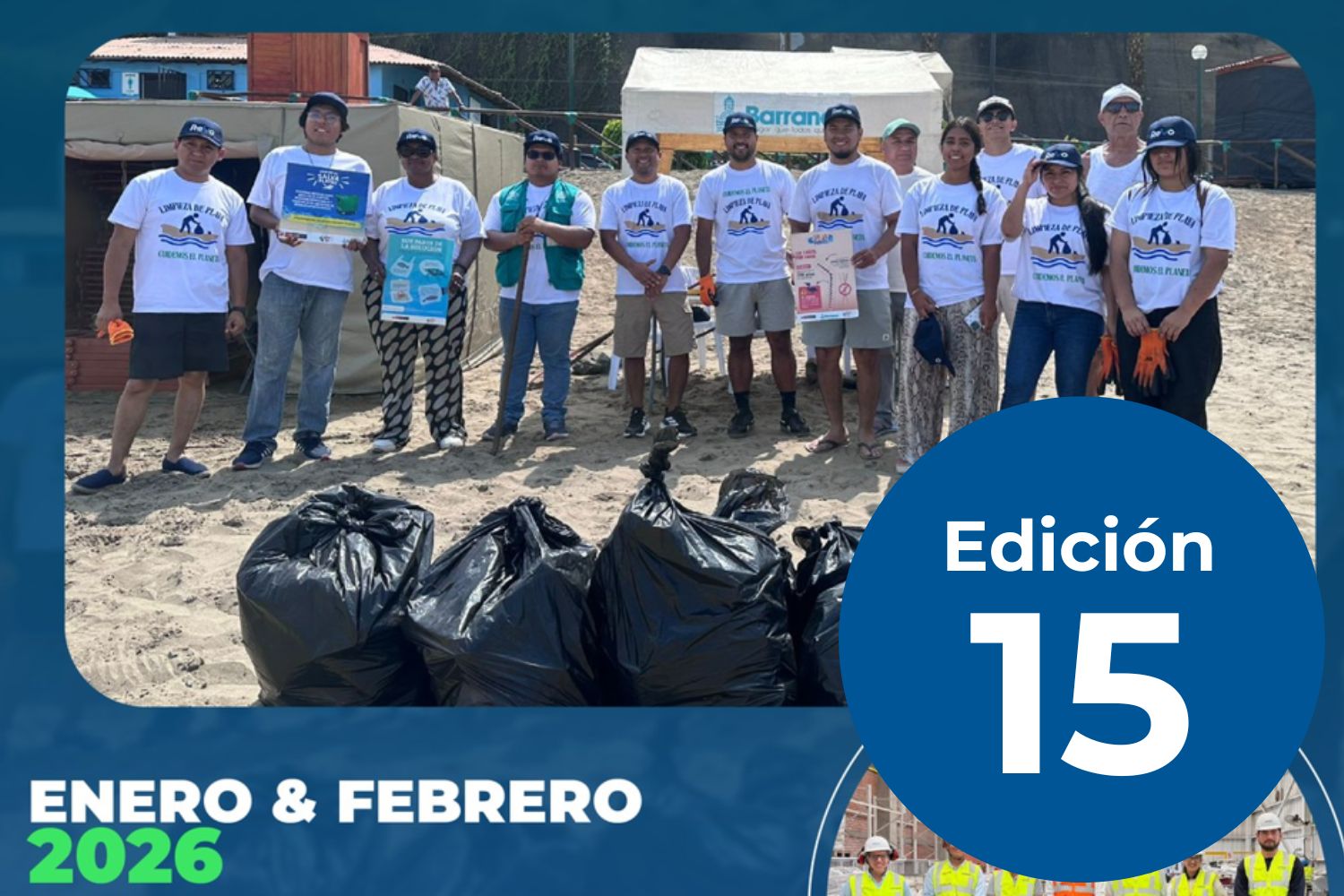 Group of volunteers in matching T-shirts standing on a beach behind several large black trash bags from a cleanup event.